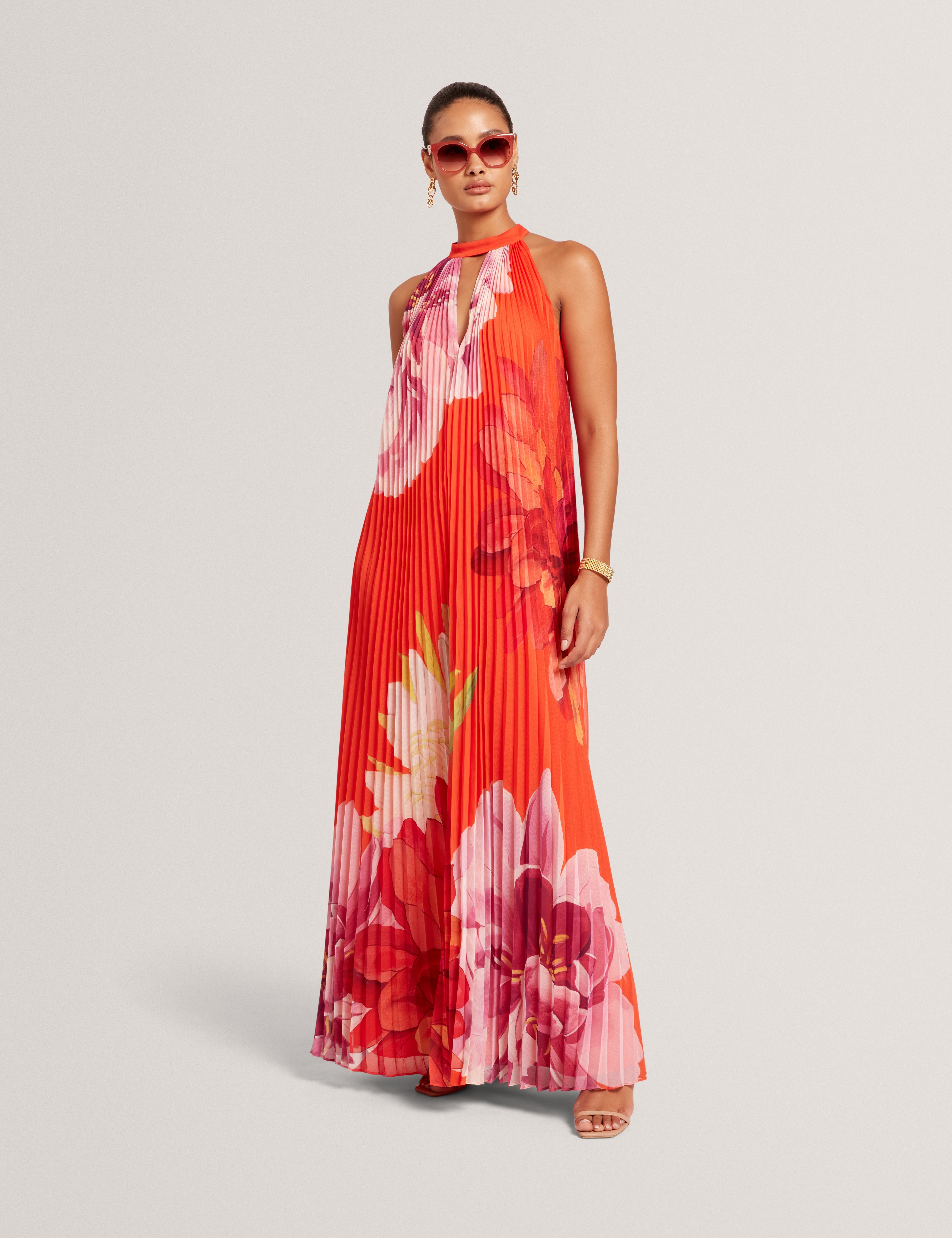Shop Materva Printed Halter Neck Pleated Maxi Dress Orangefor Women Online | Ted Baker UAE Shop Materva Printed Halter Neck Pleated Maxi Dress Orangefor Women Online | Ted Baker UAE