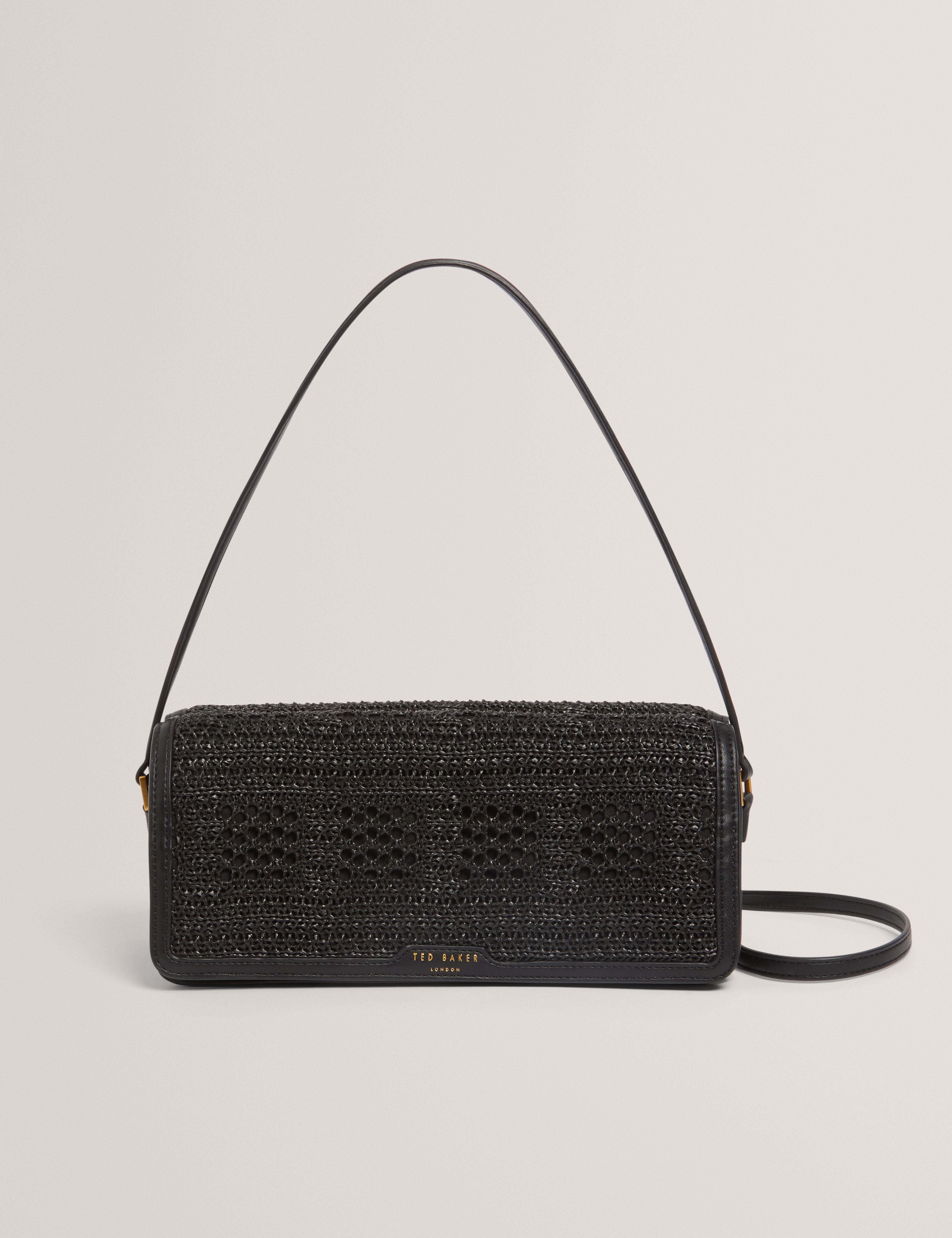 Shop Pettria Raffia Straw Elongated Shoulder Bag Blackfor Women
