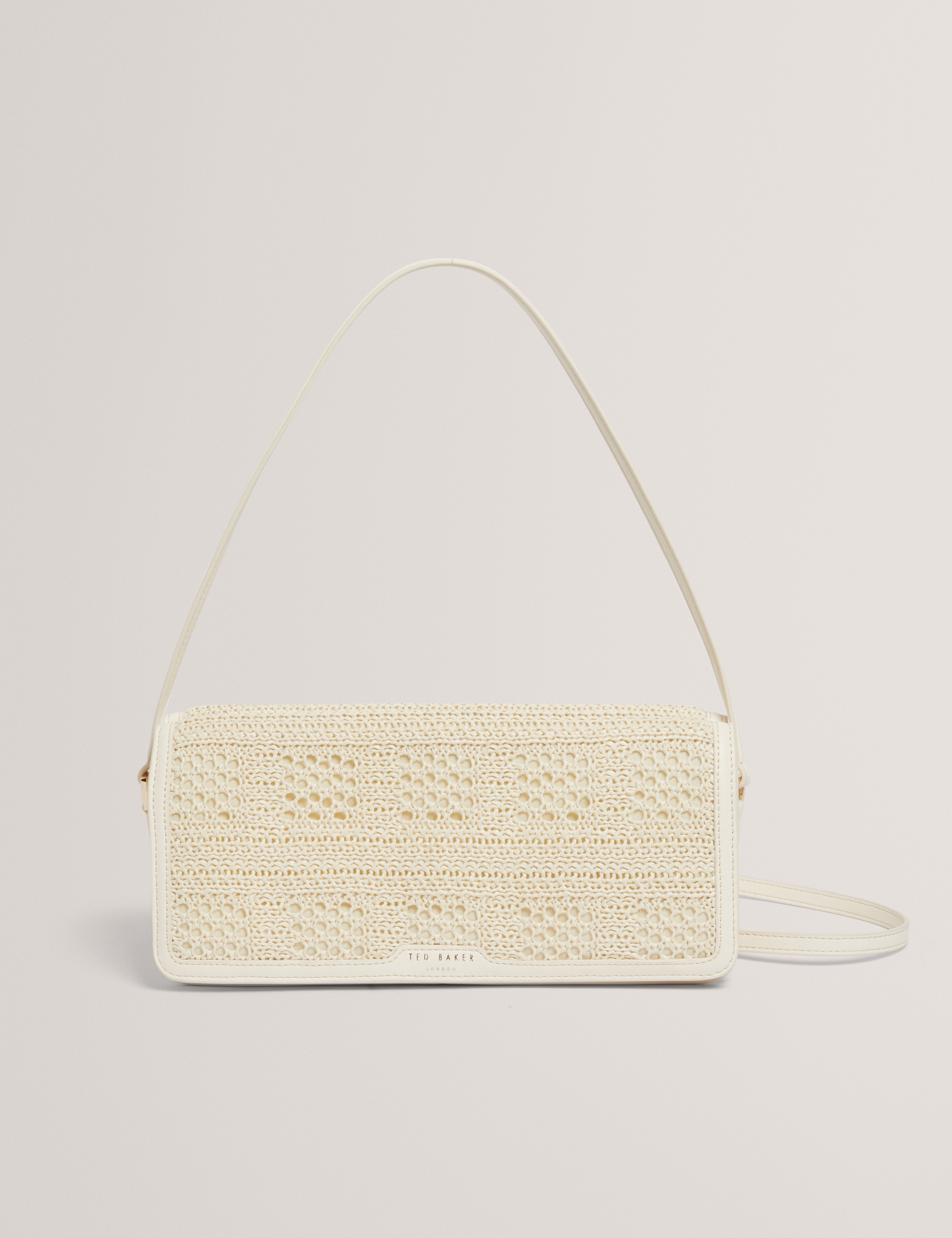 Shop Pettria Raffia Straw Elongated Shoulder Bag Ivoryfor Women