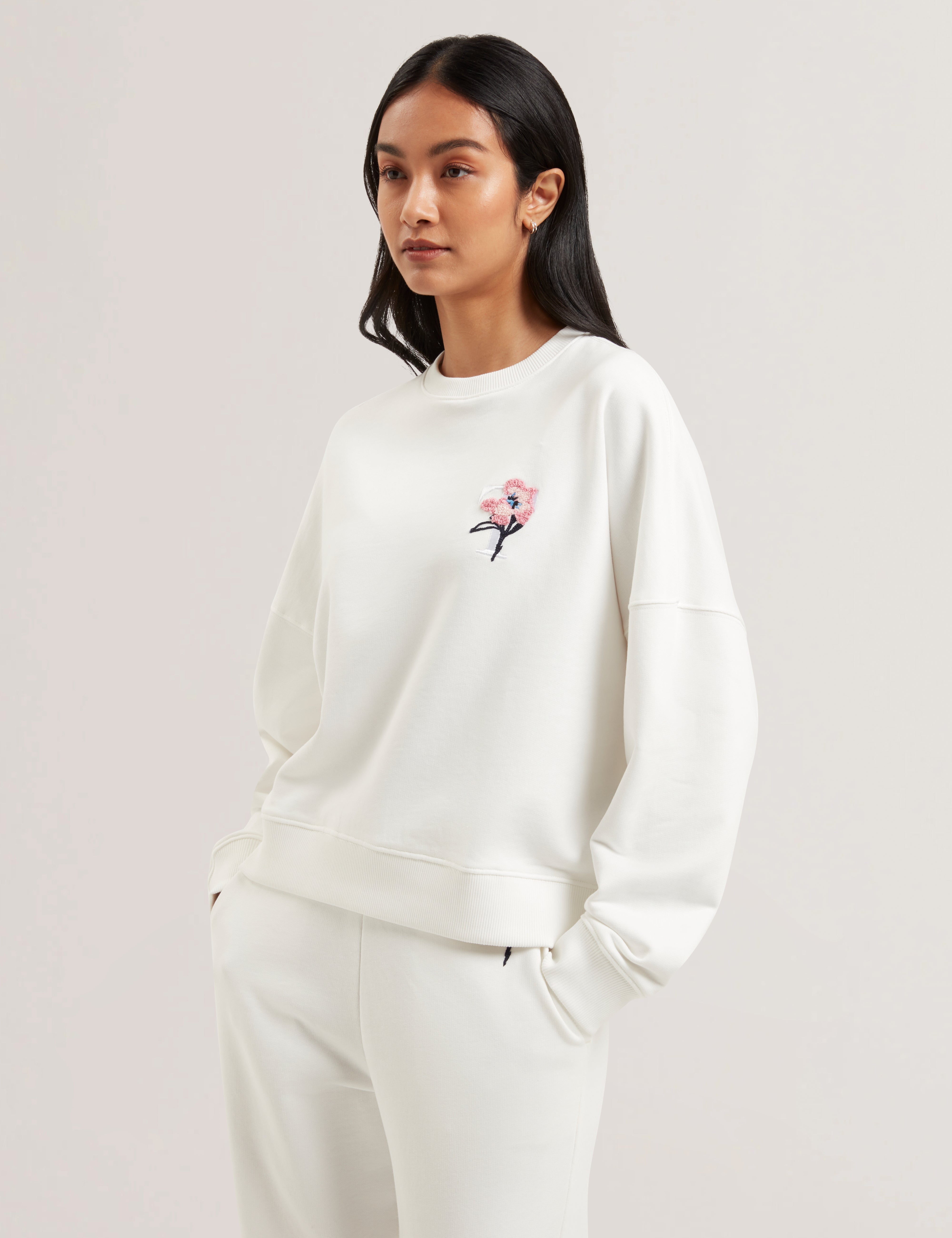 Janettt Embroidered Logo Balloon Sleeve Sweat Ivory