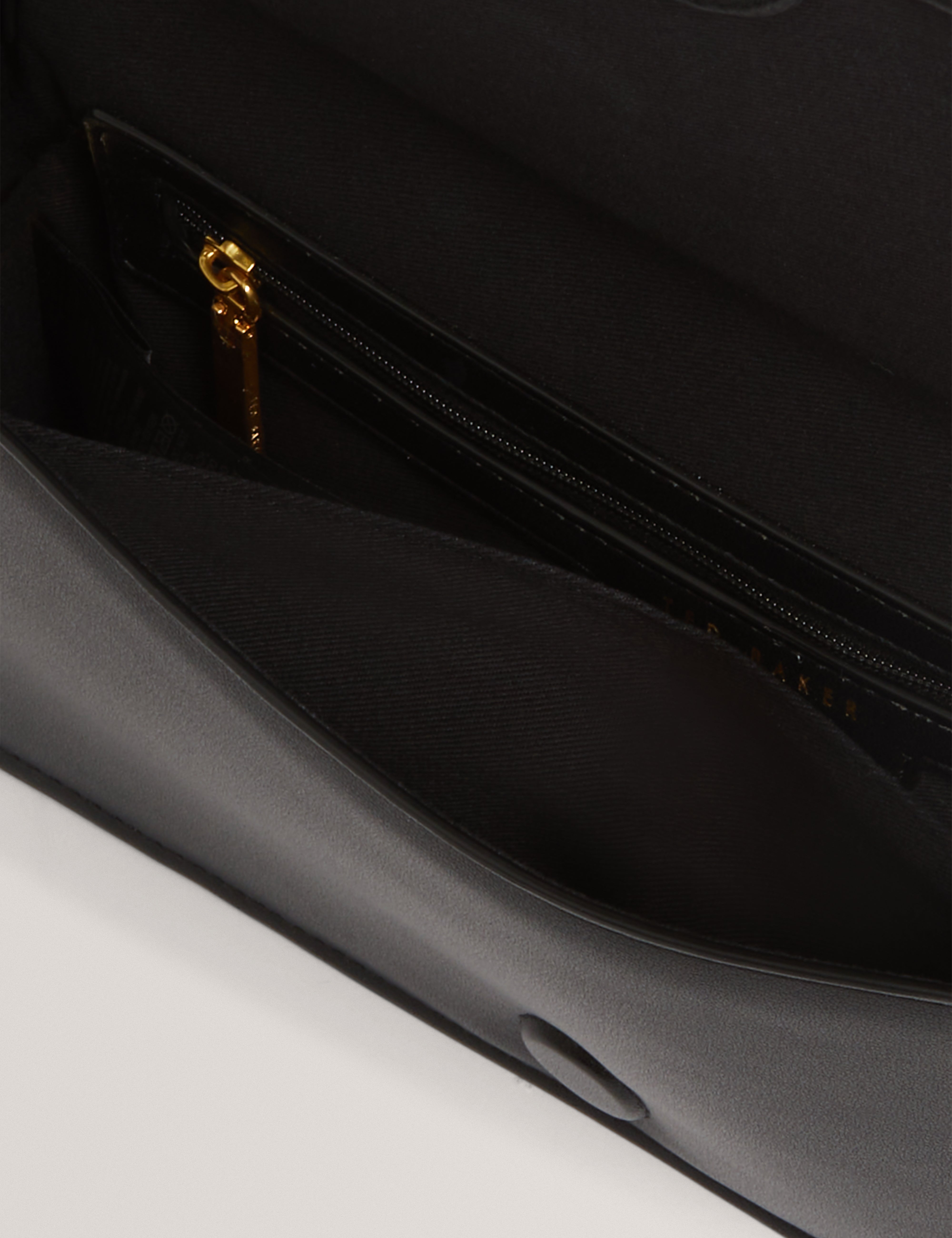 Pettria Raffia Straw Elongated Shoulder Bag Black