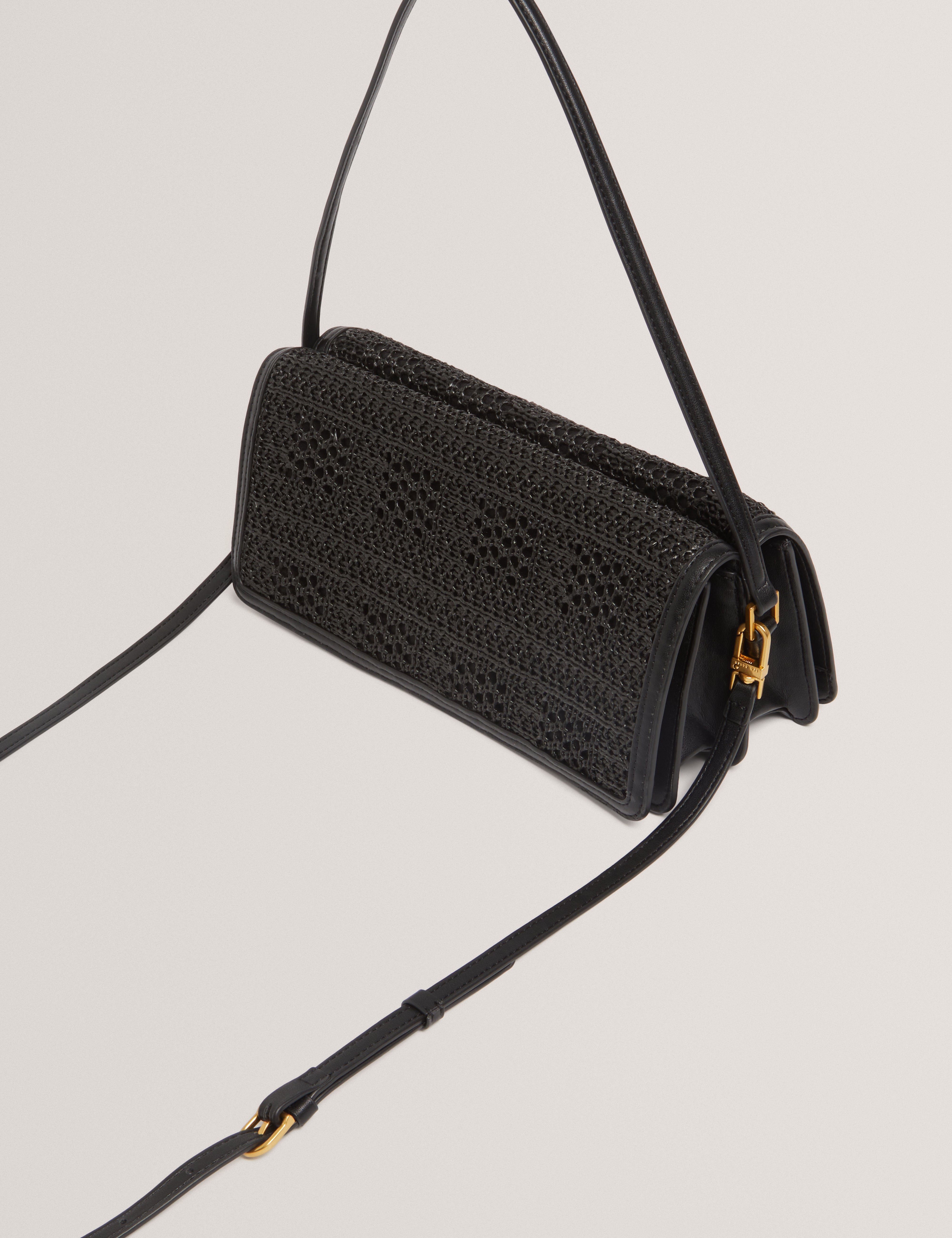 Pettria Raffia Straw Elongated Shoulder Bag Black