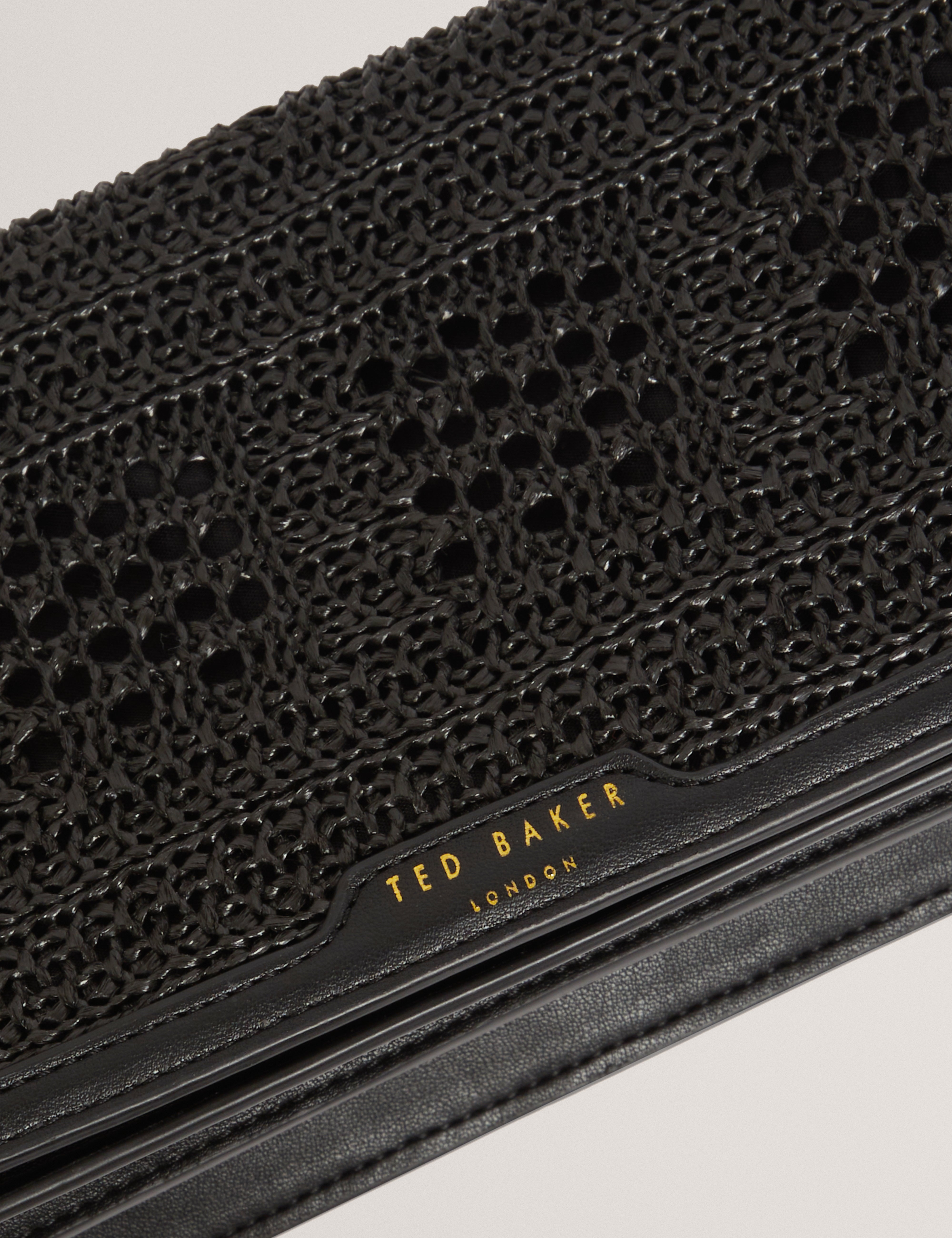 Pettria Raffia Straw Elongated Shoulder Bag Black