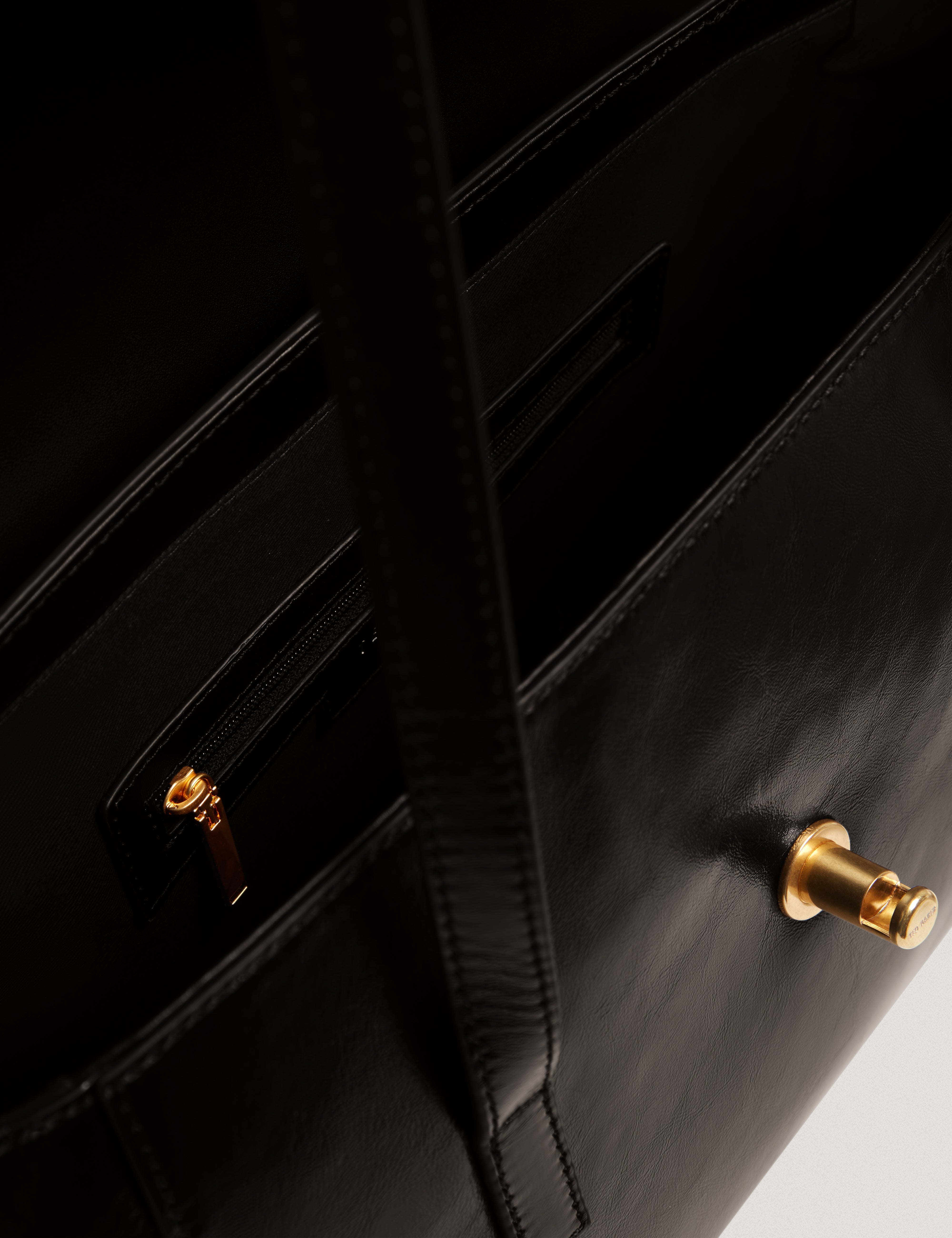 Kkamy Twist Lock Detail Elongated Shoulder Bag Black