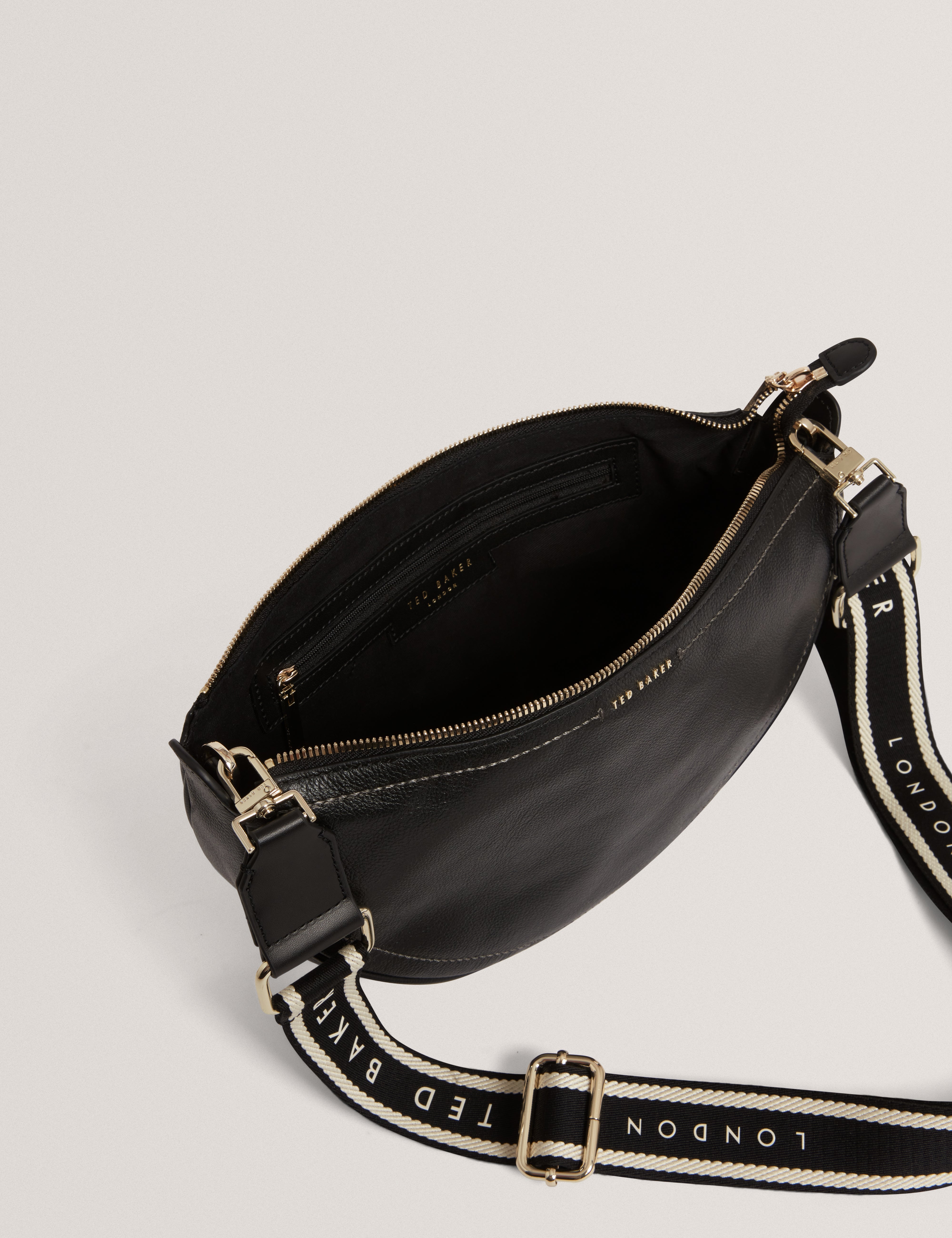 Lorreen Webbing Leather Half Moon Crossbody Bag Black