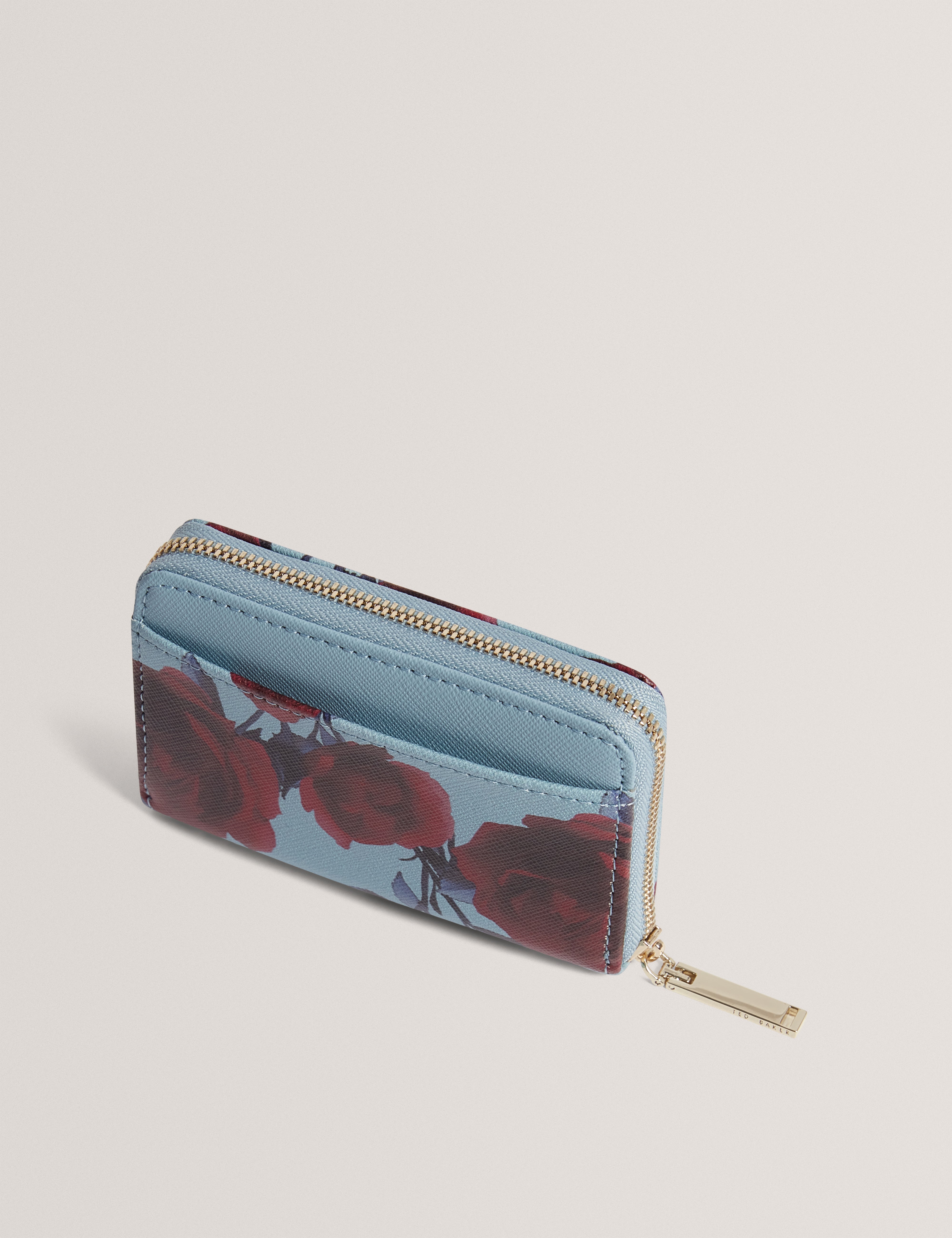 Elodi Small Rose Print Zip Around Purse Mid-Blue