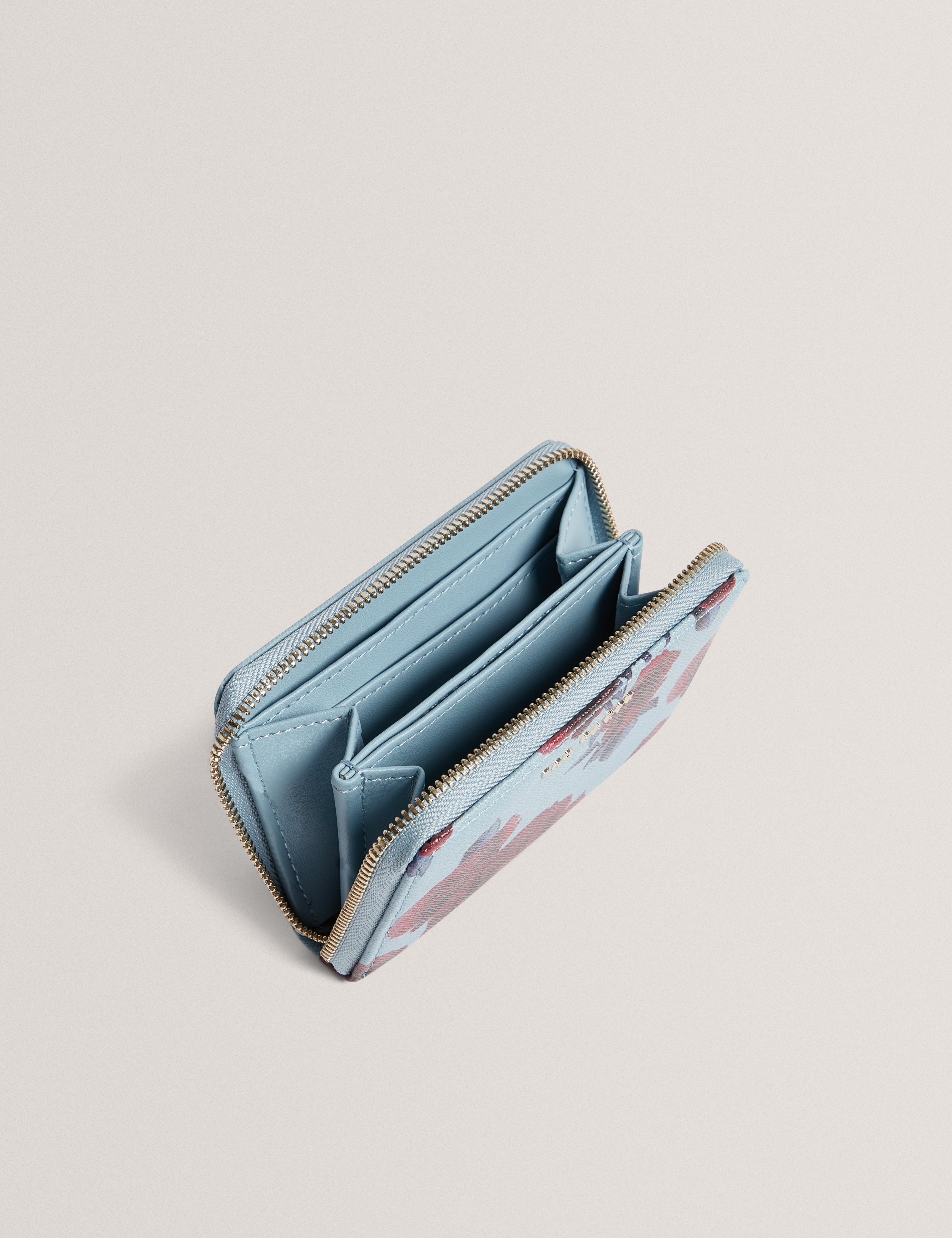 Elodi Small Rose Print Zip Around Purse Mid-Blue