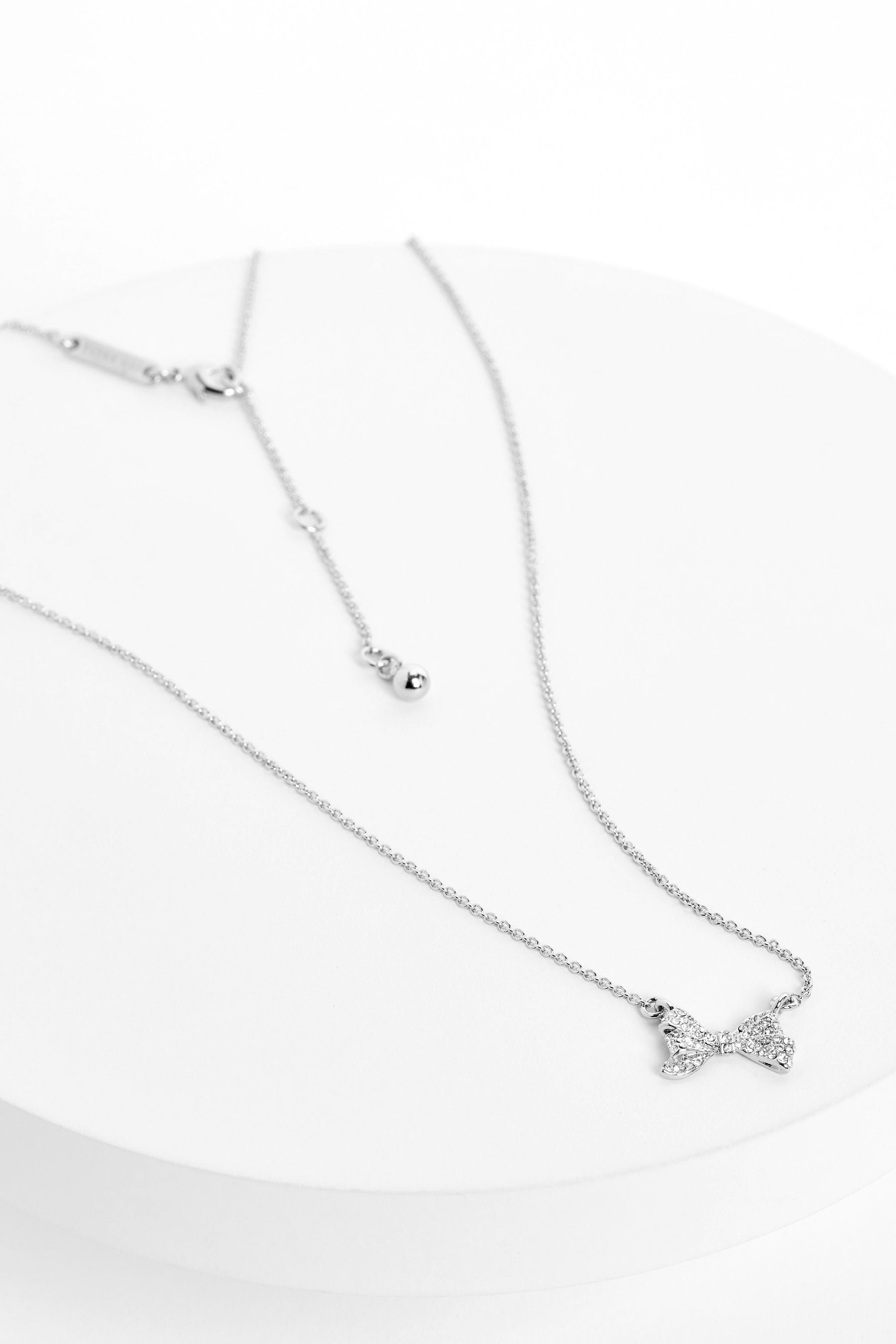 Barsie Crystal Bow Pendant Necklace Silver