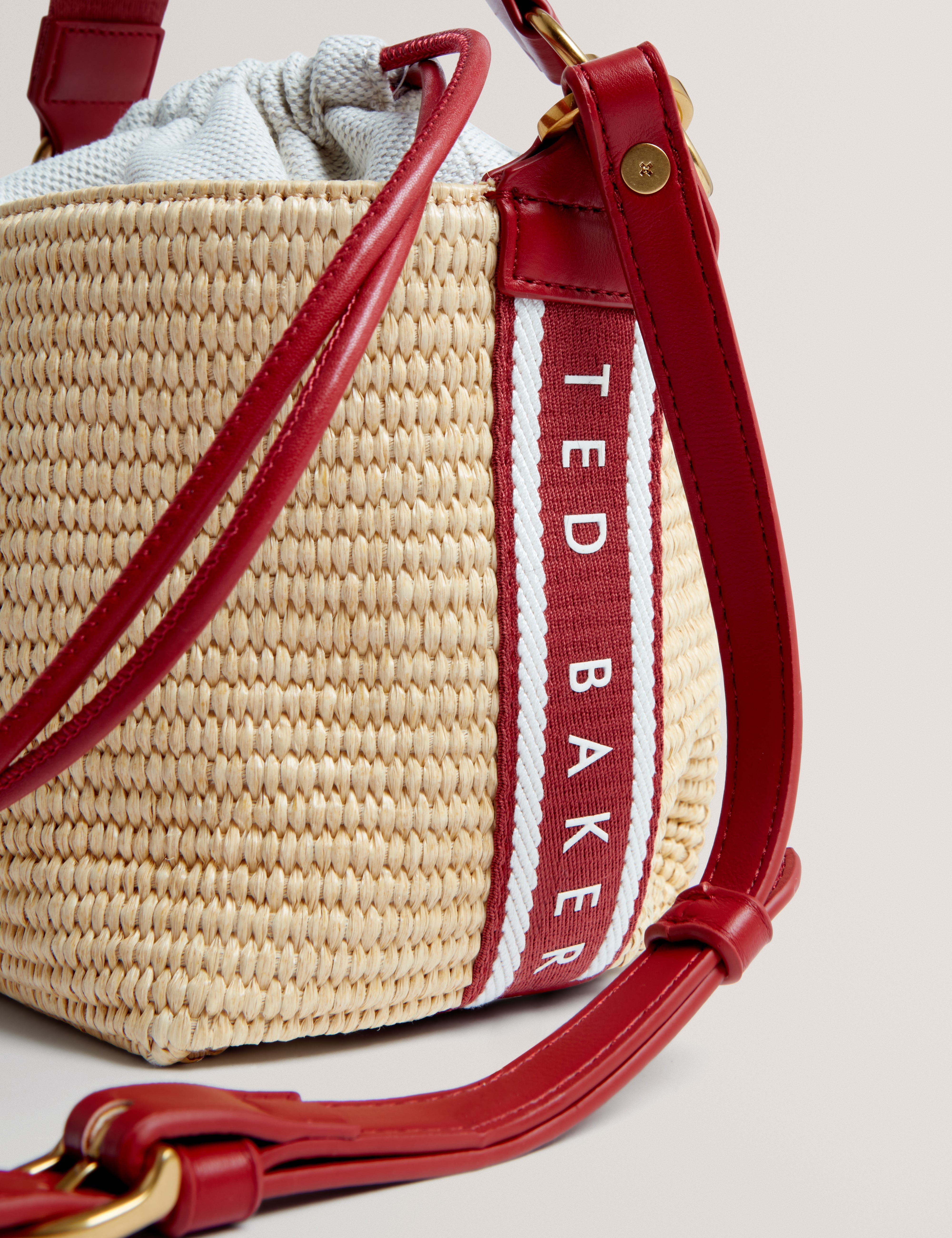 Raffyna Webbing Detail Raffia Small Bucket Bag Red
