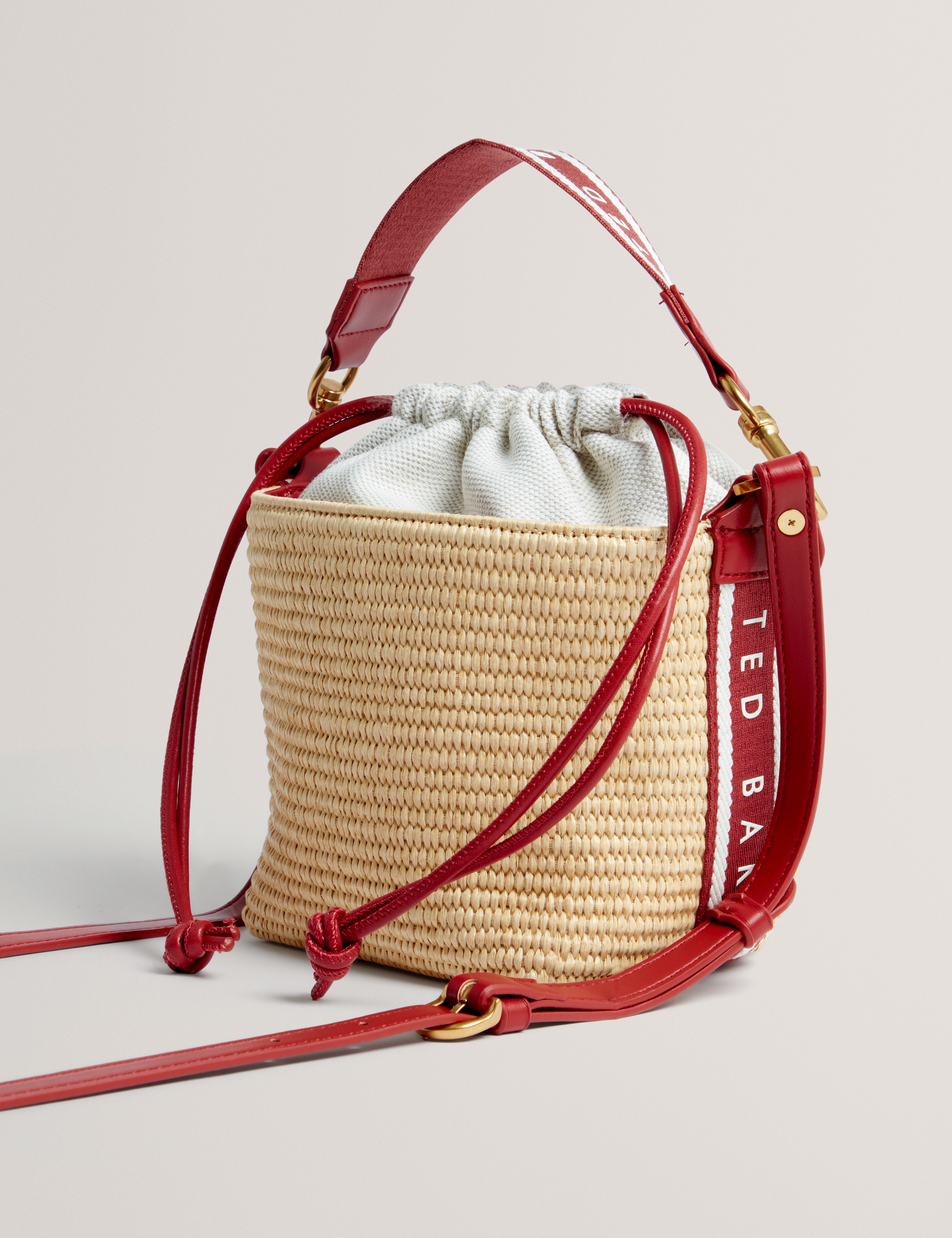 Raffyna Webbing Detail Raffia Small Bucket Bag Red