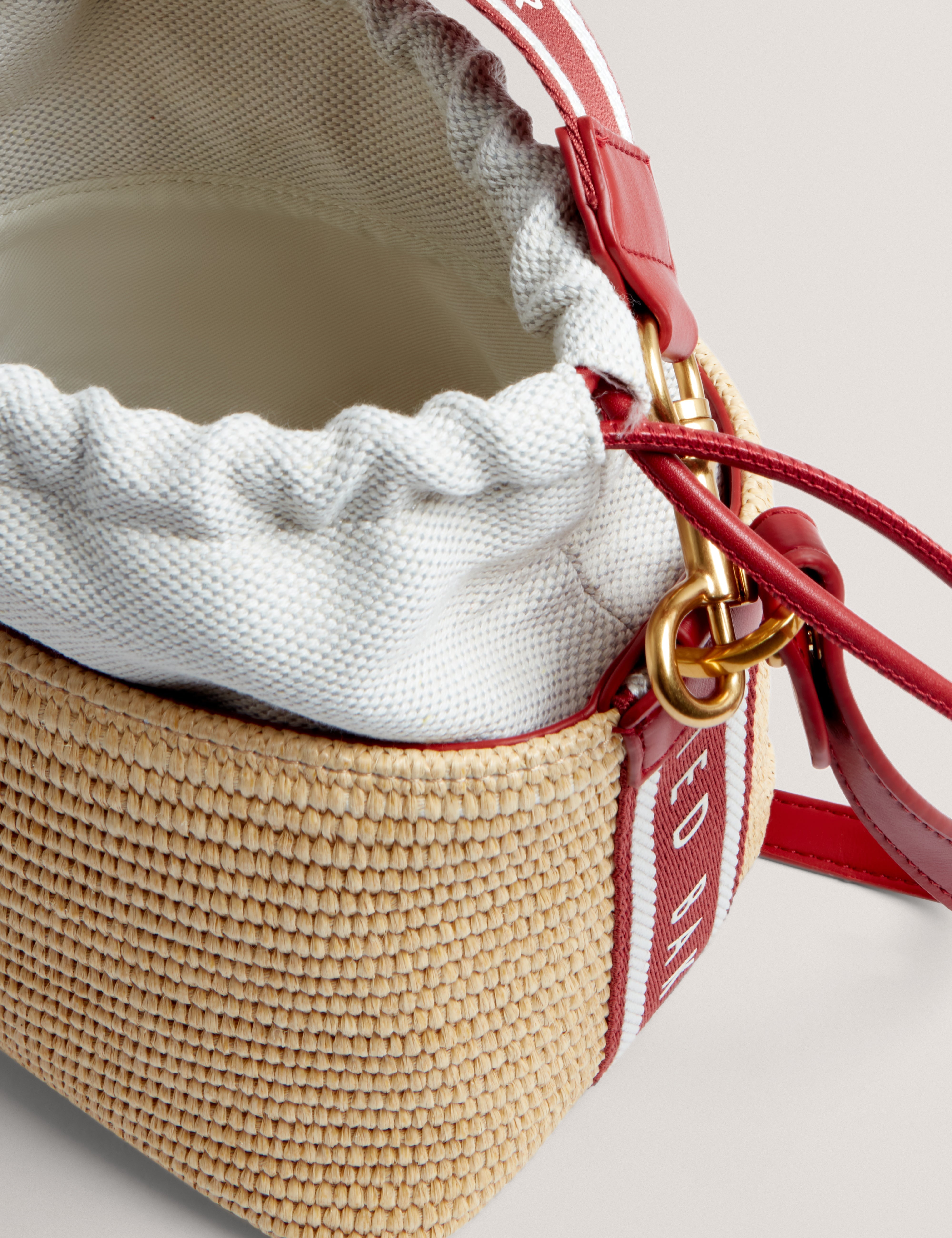 Raffyna Webbing Detail Raffia Small Bucket Bag Red