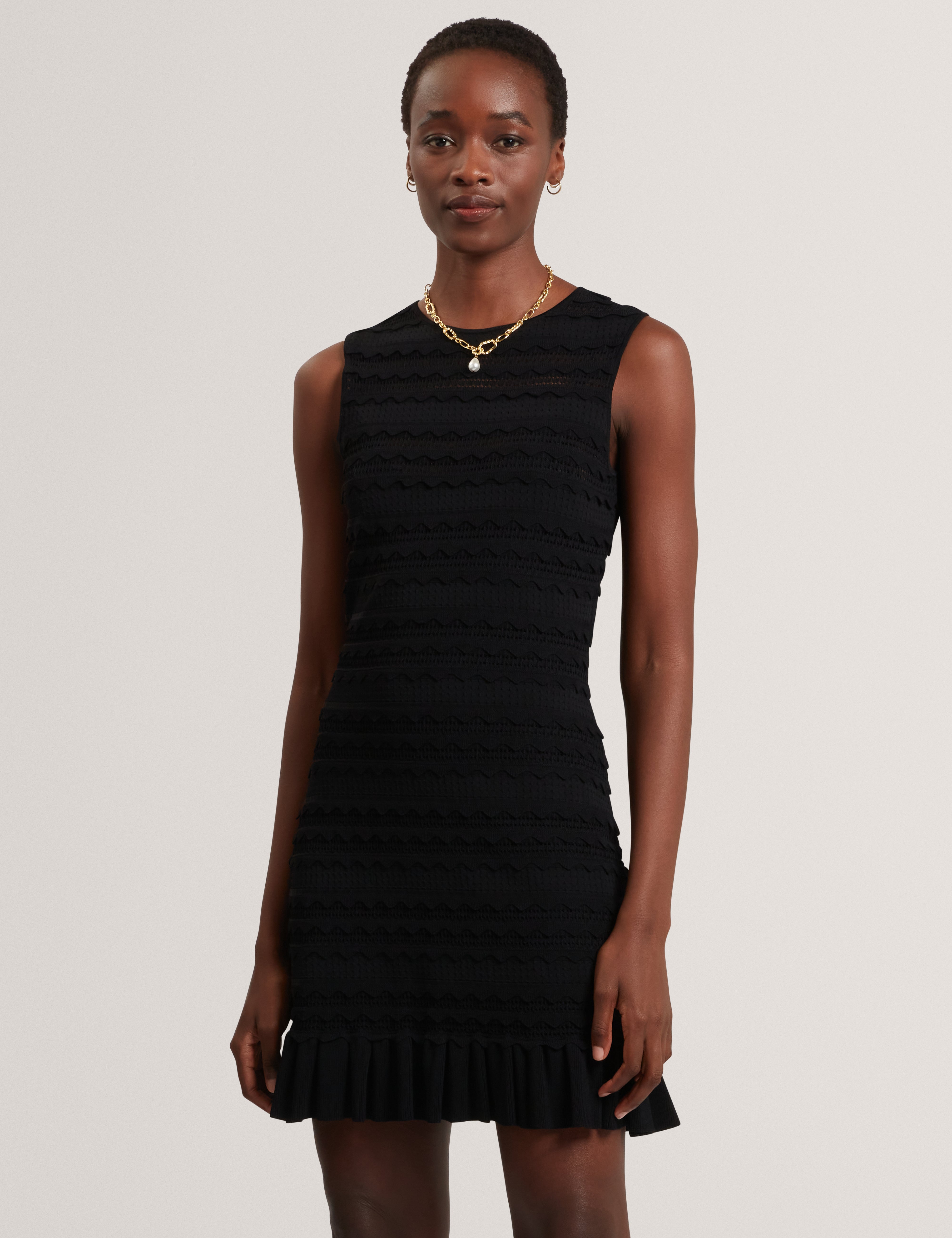Avela Knitted Mini Dress With Frill Detail Black