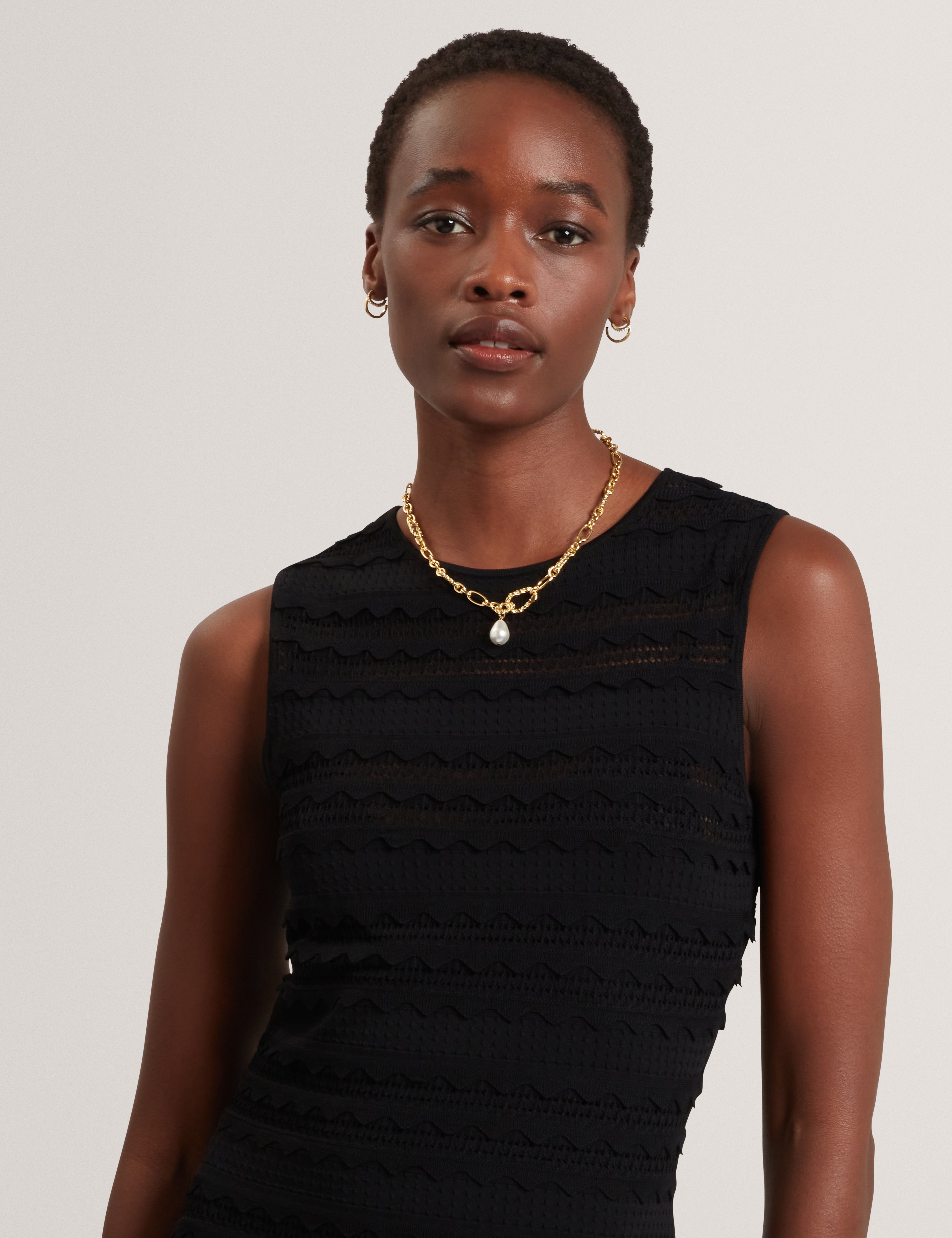 Avela Knitted Mini Dress With Frill Detail Black