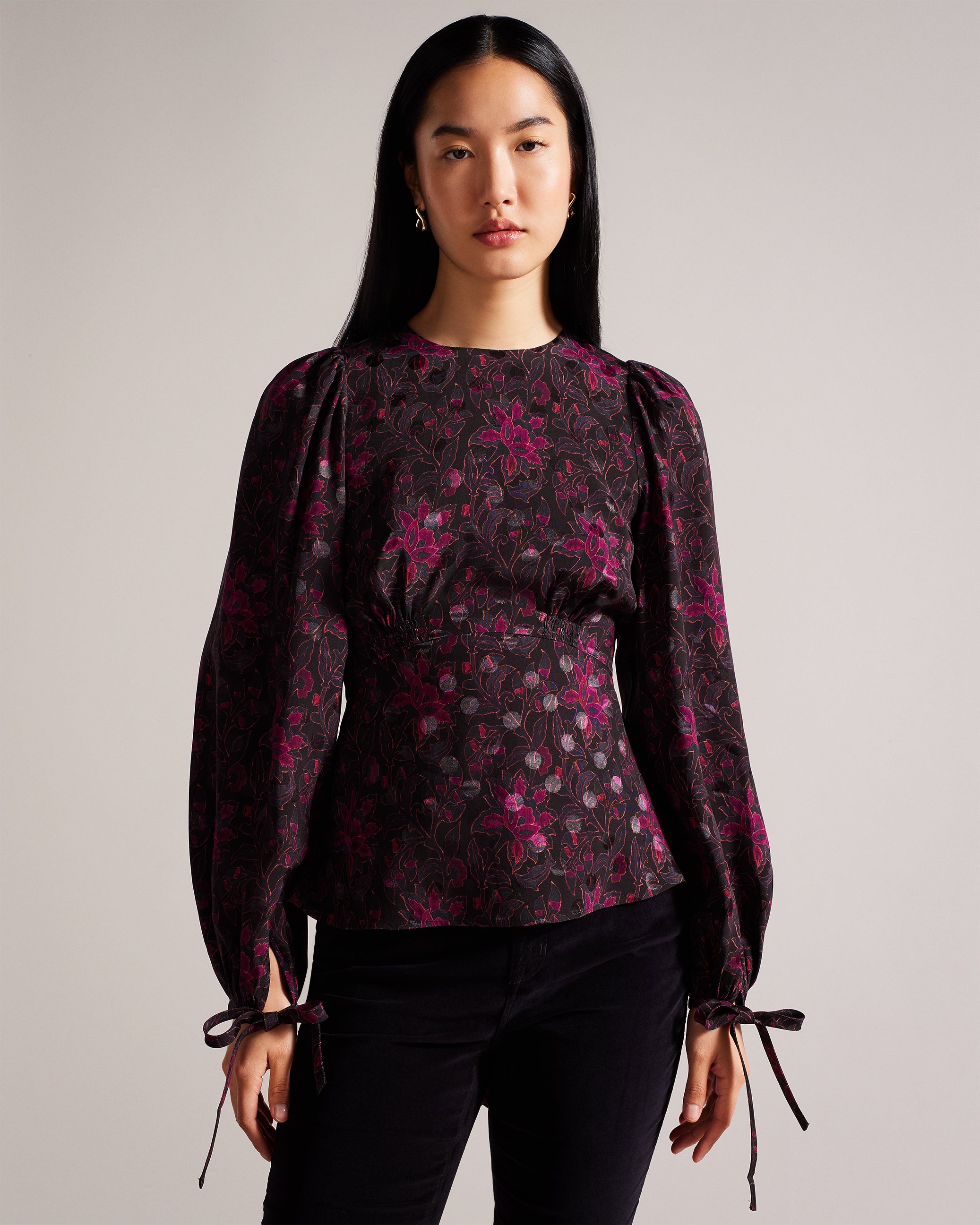 Terre Printed Peplum Top With Cuffed Sleeves