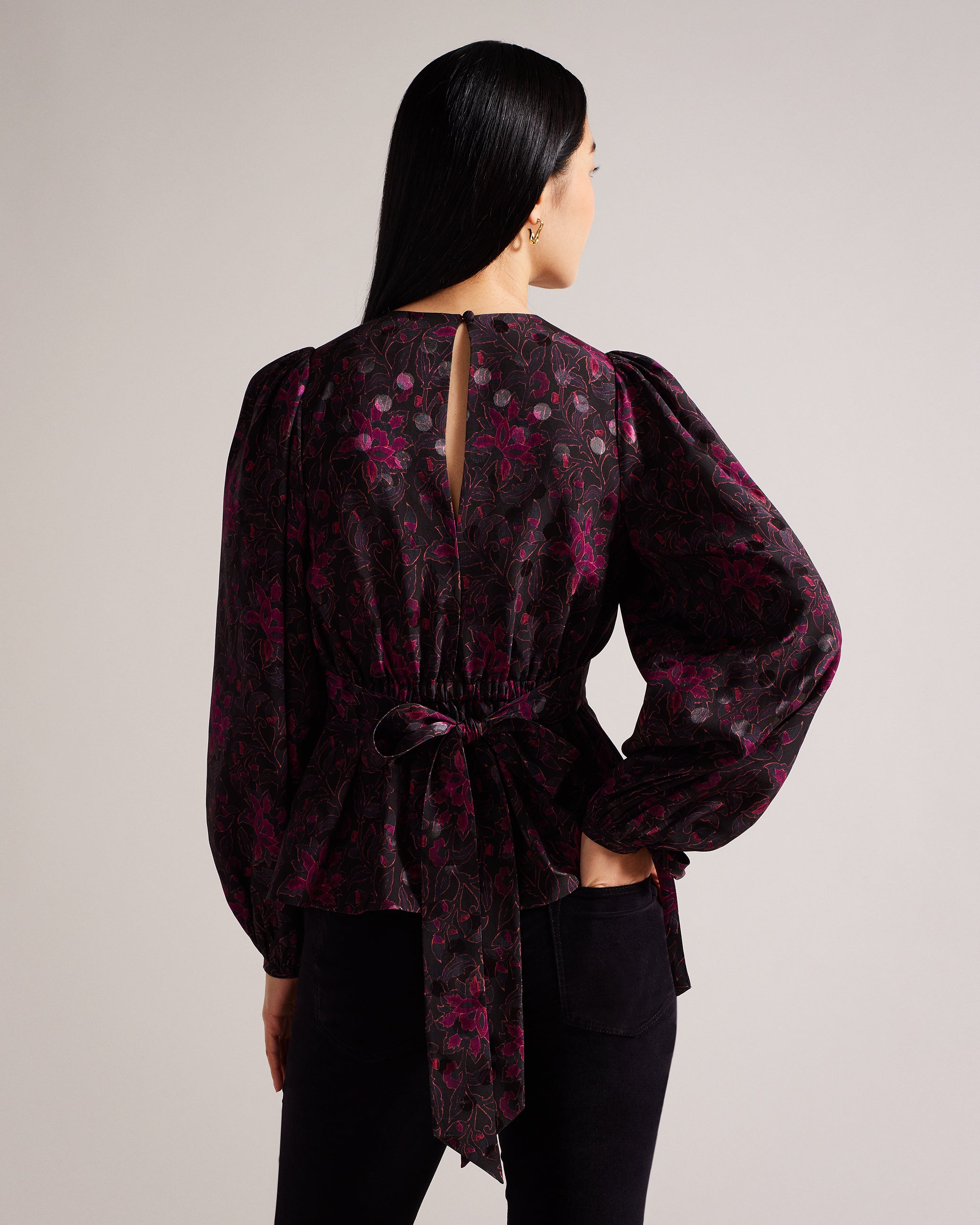 Terre Printed Peplum Top With Cuffed Sleeves